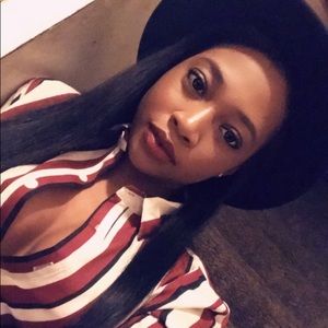 Red, cream, and black blouse